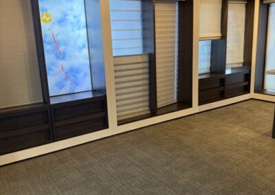 Barrows Shades and Blinds showroom display featuring various window treatments in modern, stylish setting.